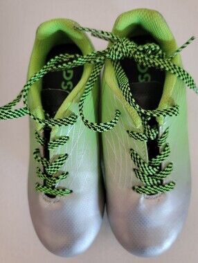 Dick's Sporting Goods Ocala 1.0 Youth Firm Ground Soccer Cleats.